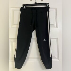 Adidas Black Track Pants with Iconic Stripes